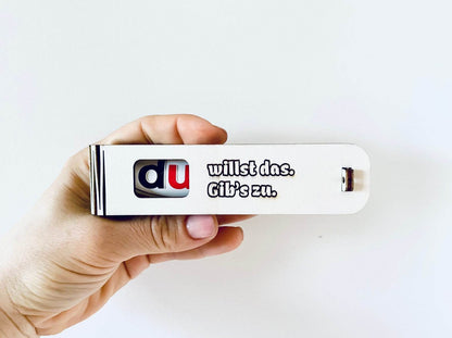 Humorvolle Duplo Geschenkidee in gravierter Holzbox mit frechem Spruch "Du willst das – gib’s zu"